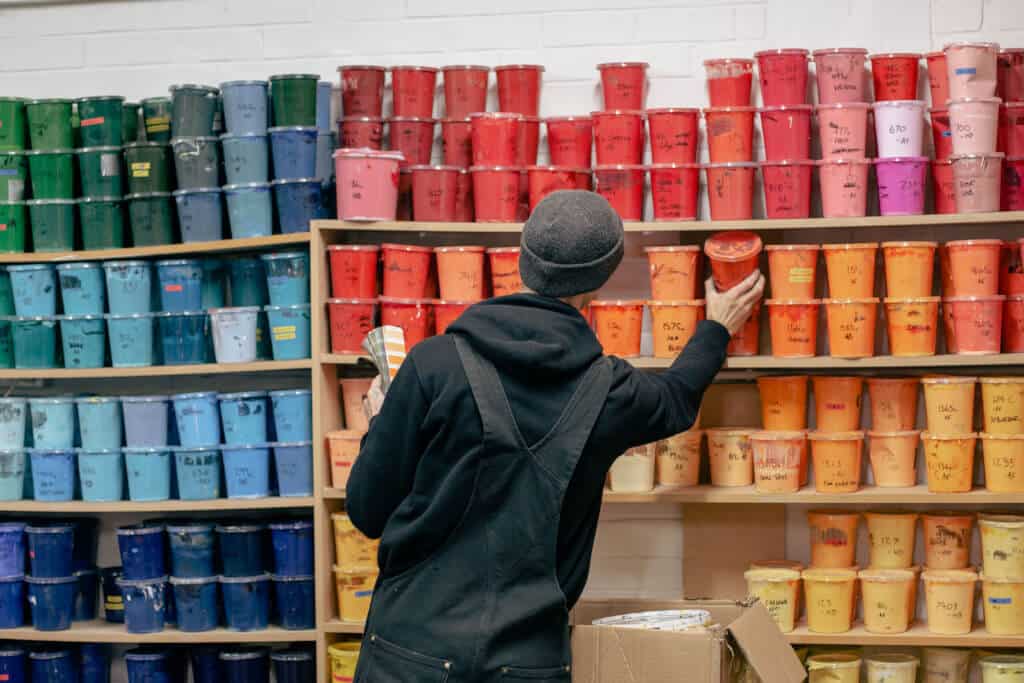 A member of the Print Room Team choosing an ink colour